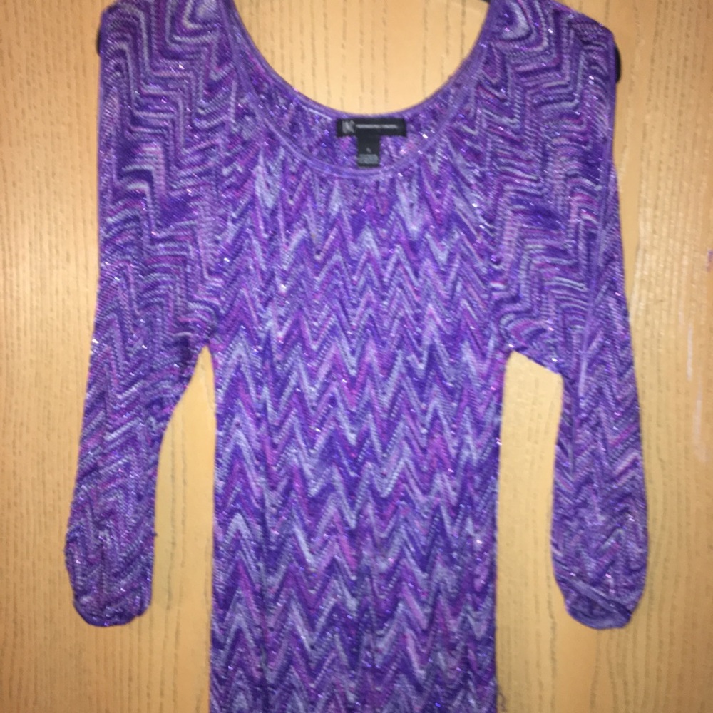 Various shades of purple. Hand knitted peekaboo